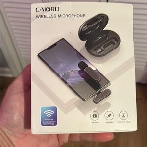 Wireless Microphone with Black Accessories